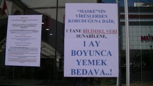 35 maske cezası yiyince, vitrinine bunu astı