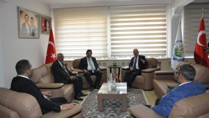 Özdağ'dan , ETB Başkanı Oral'a ziyaret