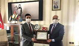 Kaymakam Taş'a fahri hemşehrilik beratı